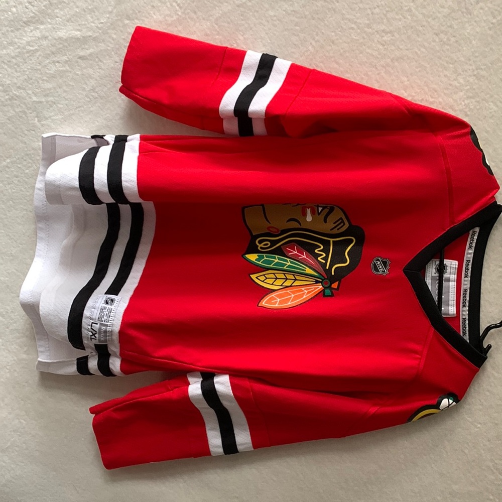 Youth black hawks jersey size L/XL